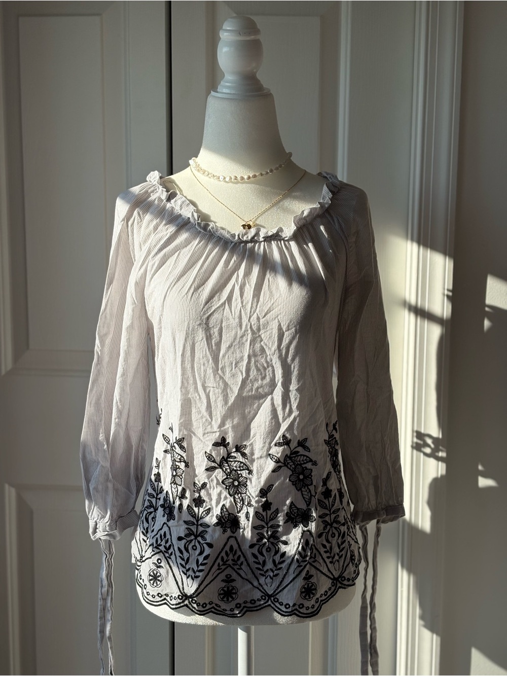 Sweet Wanderer White Peasant Blouse with Black Floral Embroidery